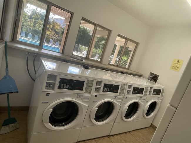 Community laundry room washer and dryer - 13006 Wimberly Sq