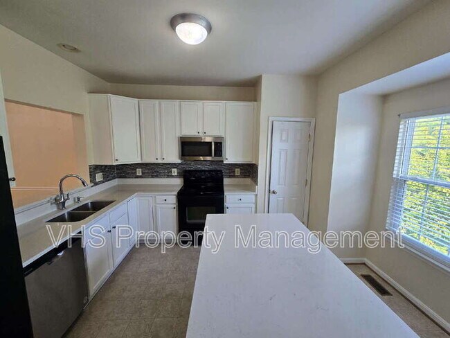 Building Photo - 6186 Library Ln
