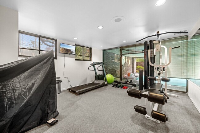 Building Photo - Elegant Corner Condo with Spacious Interiors