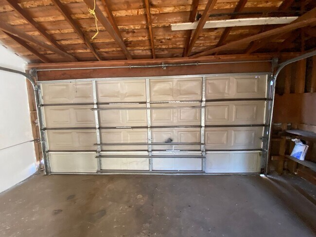 Building Photo - Hard to Find 1 BD 1 BA House with a 2 car garage and it's own yard.