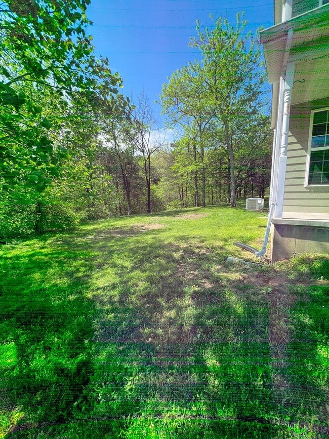 Building Photo - 3 bed, 2 bath, 2 car garage Home on 5 Acres