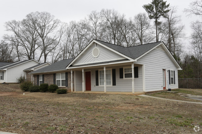 Building Photo - Rocky Creek Village