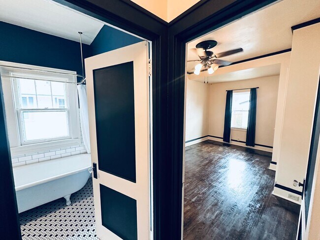 Building Photo - Charming 2-Bedroom Home w/ Finished Loft, Open Floor Plan & Sunroom!