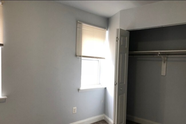 bedroom & closet - 3200 Haverford Ave