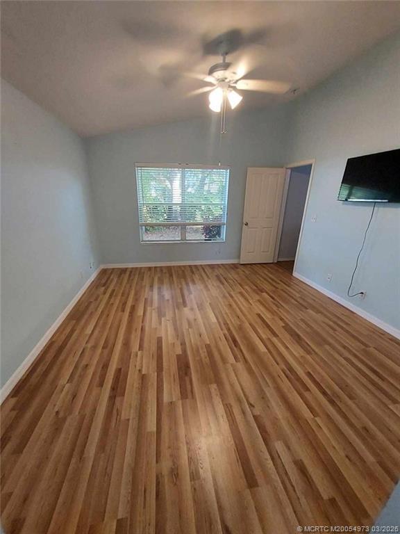 Building Photo - 3486 SW Pindo Palm Ln