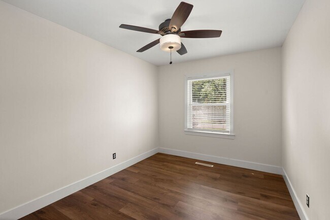 Building Photo - Spacious Split-Level Living with Dual Fireplaces & Expansive Deck