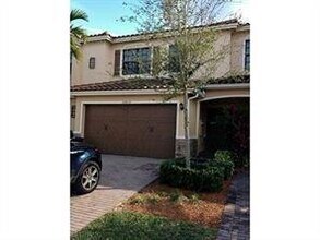 Building Photo - 10810 NW 74th Dr