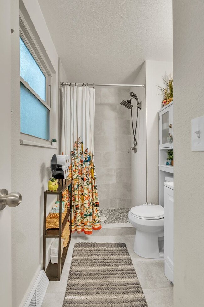 Building Photo - 4 Bedroom Home with Finished Basement, Chef’s Kitchen & Large Yard in Hampden Heights