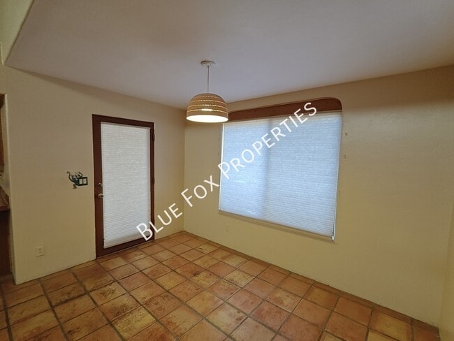 Building Photo - 9097 N Jessy Ln