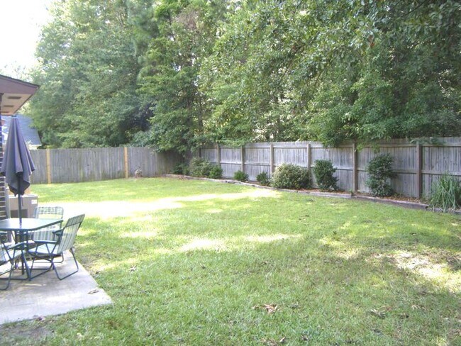 Spacious backyard. Fenced in for privacy. - 120 Colonial Ct