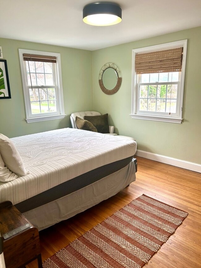 Building Photo - Sunroom Retreat | Fully Furnished 3BR with Private Fenced Yard