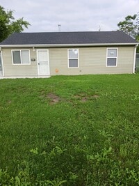 Building Photo - Rehabbed Home with Fenced Back Yard