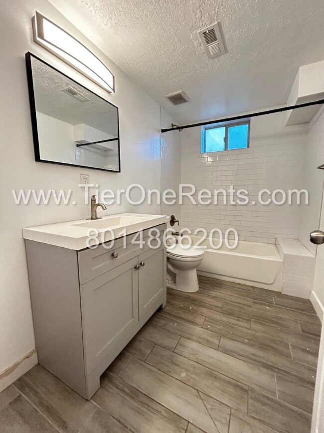 Building Photo - NO DEPOSIT option available for qualified ...