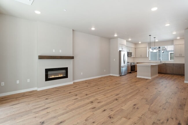 Building Photo - NEW CONSTRUCTION – Stylish 4-Bedroom Townh...