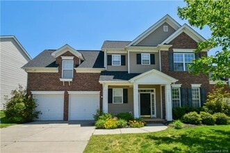 Building Photo - 4 BR/2.5BA  Community Pool | Fenced backyard!
