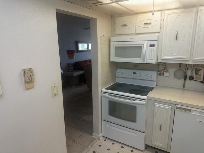 Building Photo - Furnished 2 Bedroom, 2 bath condo across f...