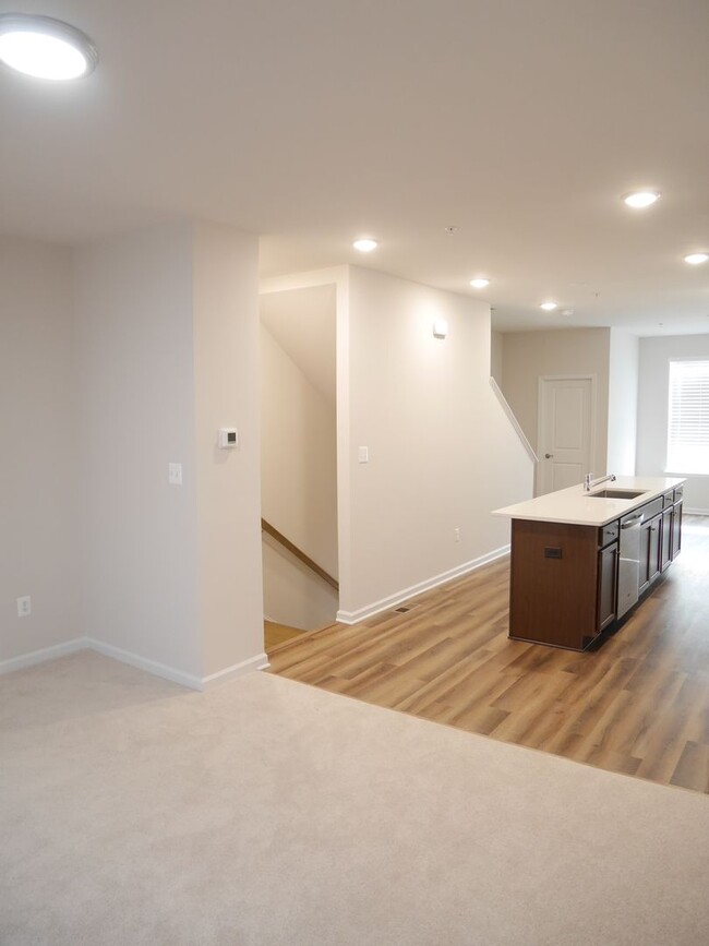 Building Photo - NEW BUILD! Four Bedroom Townhome- Prime Lo...