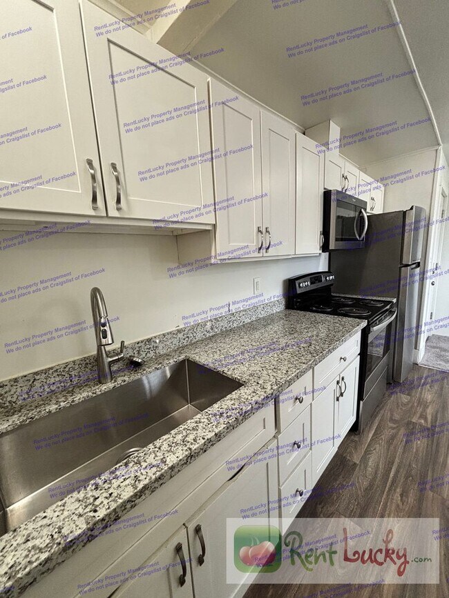 Building Photo - Singh Tacoma 4-Plex