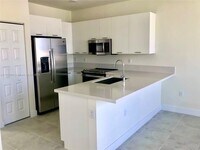 Building Photo - 6455 NW 103rd Pl