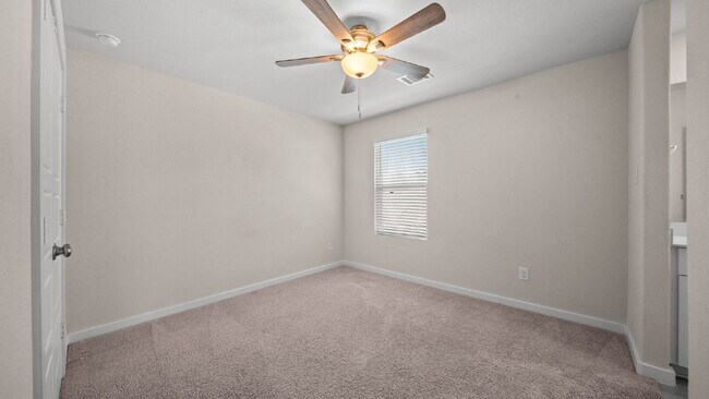 Building Photo - Spacious and well-maintained 4-bedroom, 3.5-bath home in desirable Pine Lake Cove offering flexib...