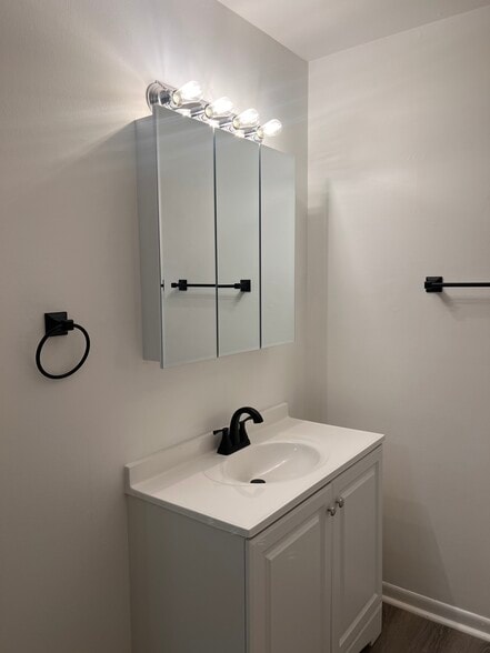 Updated Bathroom. New Vanity & Medicine Cabinet. - 7220 Madison St