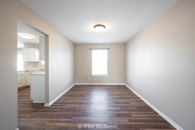 Building Photo - "Spacious 4-Bedroom Gem with Finished Base...