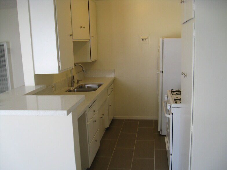 Kitchen - Malia's Apartments