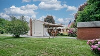 Building Photo - UPDATED!! 3 bed, 2 bath house with solar p...