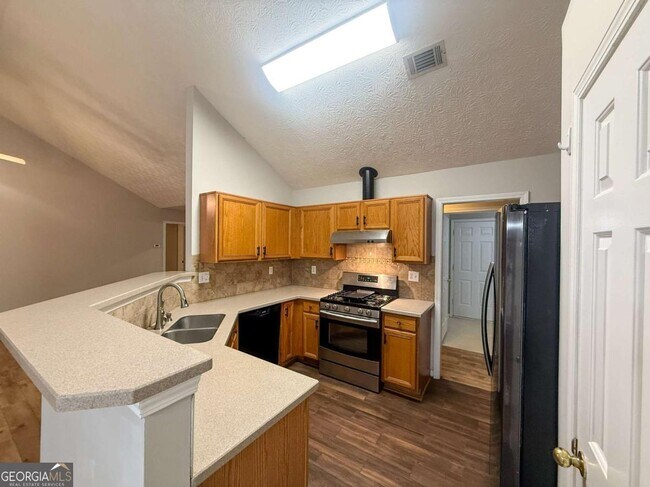 Building Photo - 5555 Grove Place Crossing SW