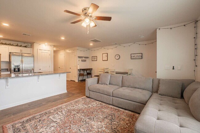 Building Photo - Partially furnished and now available!