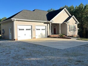 Building Photo - Lovely Custom Built Home with 2 Car Garage...