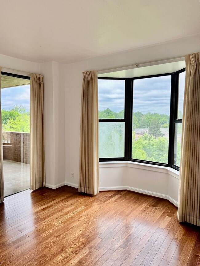 Building Photo - Experience Luxury and Prestige at Yorktown Condominiums