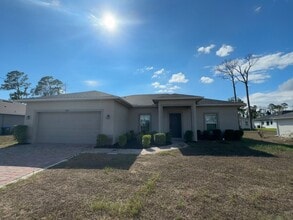 Building Photo - 3 Bed + Den with 2 Baths & 2 Car Garage