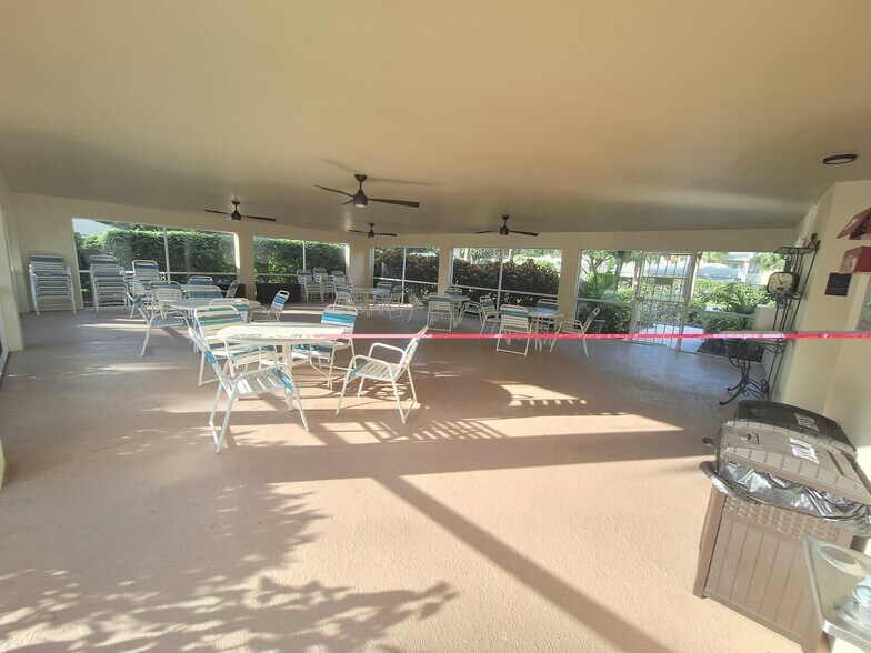 Cabana and restrooms at Bermuda Park pool - 25727 Lake Amelia Way