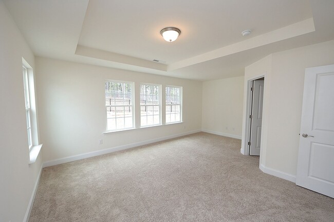 Building Photo - Immaculate End Unit Townhome in Research Triangle Park