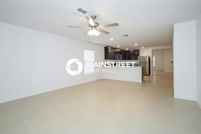 Building Photo - 4 Bedroom Pet-Friendly Home in Mascotte, FL with Main Street Renewal