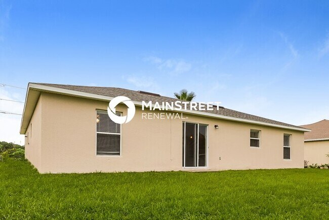 Building Photo - 3 Bedroom Pet-Friendly Home in POINCIANA, FL with Main Street Renewal