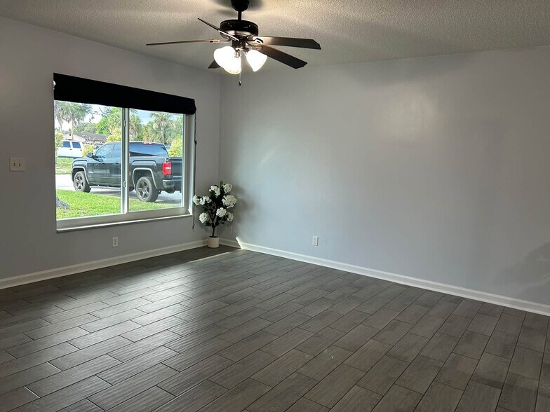Professionally installed black-out blinds throughout! Plus fancy and effective ceiling fans - 7669 SE James St