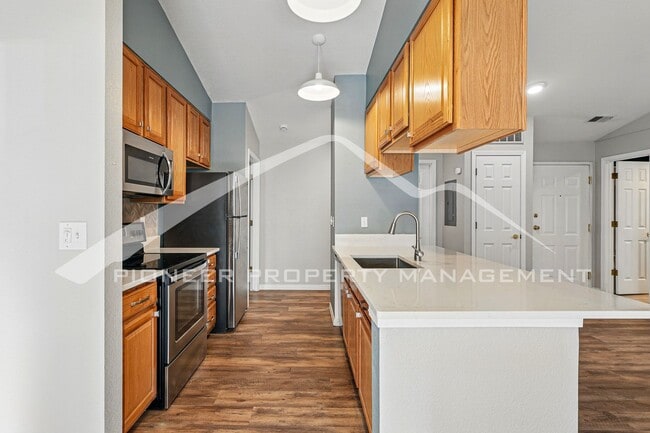 Building Photo - Updated Condo with Central AC and Gas Fireplace