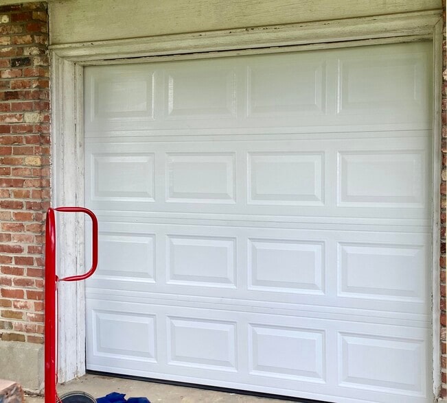 One car attached garage and additional workspace - 8003 Broadfern Dr