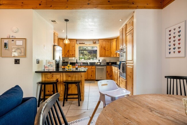 Building Photo - Charming 3 Bed Mountain Retreat | Wood Beams, Fireplace & Deck