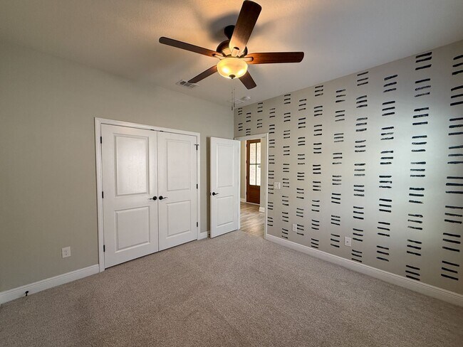 Building Photo - Spacious 3 Bedroom 2 Bath + Office with Split Floor Plan & Screened Patio in Pace!