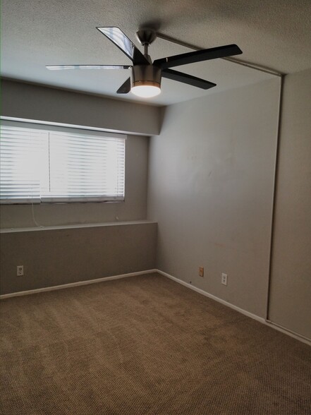 Large 2nd bedroom with huge closet and contemporary light/fan. - 18681 Maplewood Cir