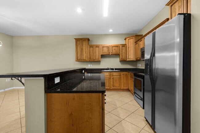 Building Photo - "Charming 3-Bedroom Townhouse Oasis in For...