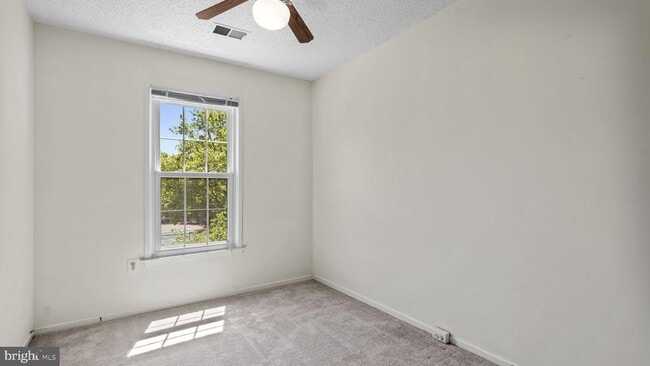 Building Photo - This stunning 3-bedroom, 2-bathroom interior townhome is sure to impress.