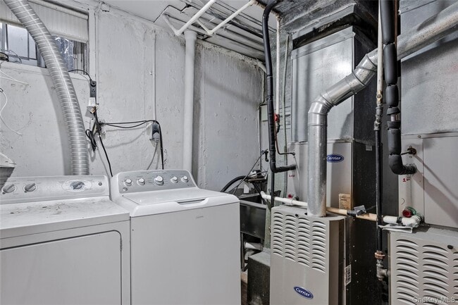 Building Photo - 15-69-69 215th St