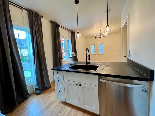 Building Photo - Private and Stylish One-Bedroom, Available...