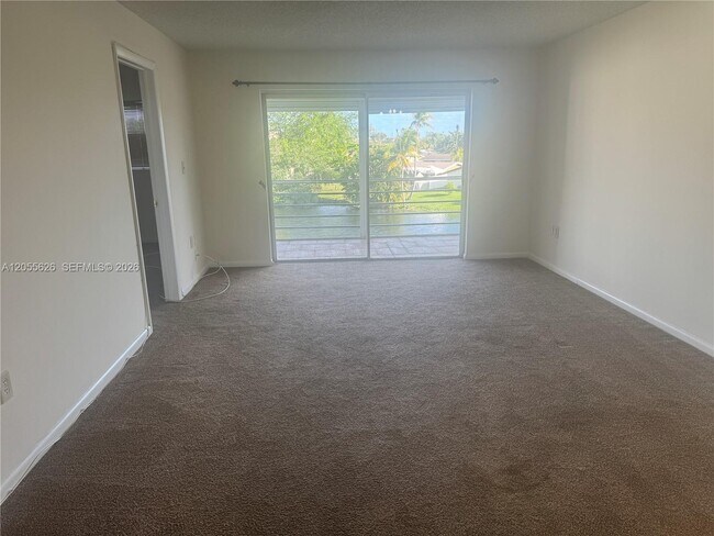Building Photo - 8135 Sunrise Lakes Blvd