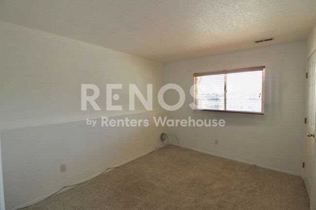 Building Photo - Spectacular views come with this Fantastic Golden Townhome