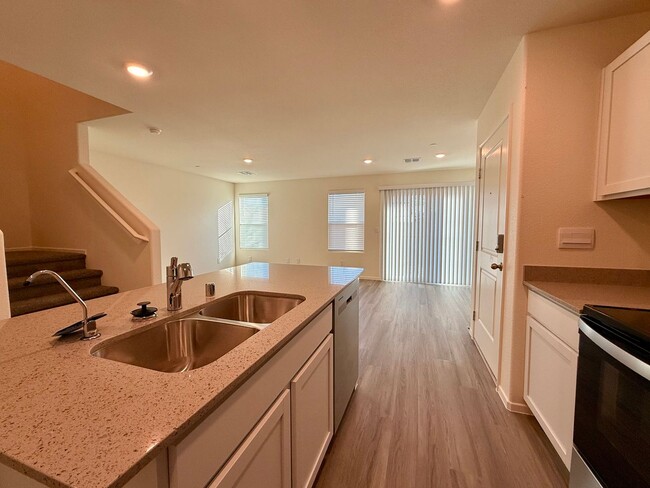 Building Photo - Brand-New Townhome for Rent in the Highly ...